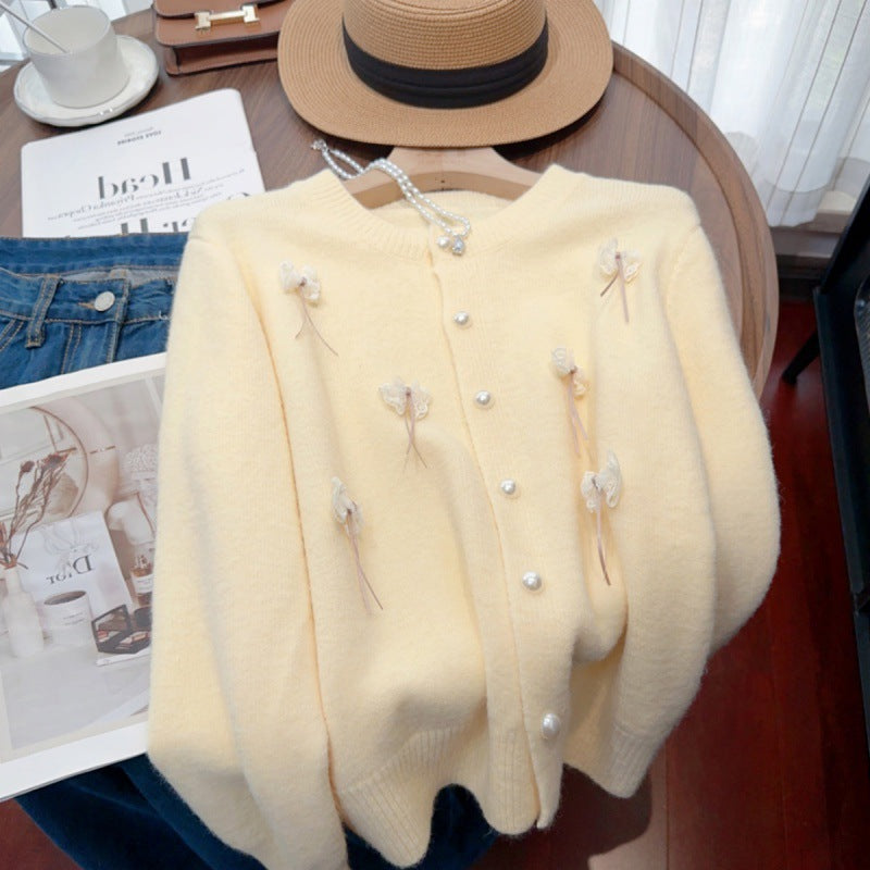 Knit jacket for women with feminine appliques and chic button details