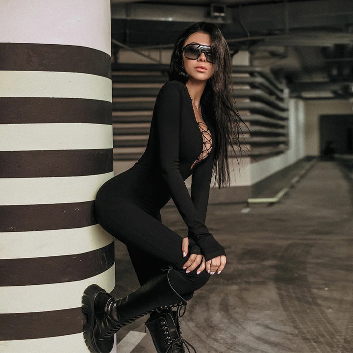 Fitted jumpsuit for women with deep V-neckline and refined lace-up details Chic and Style