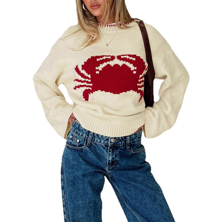 Knitted sweater for women with a climbing creature design Lune London