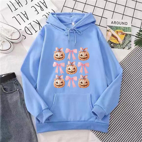 Women's Hoodie with Cheerful Pumpkin Design Chic & Stil