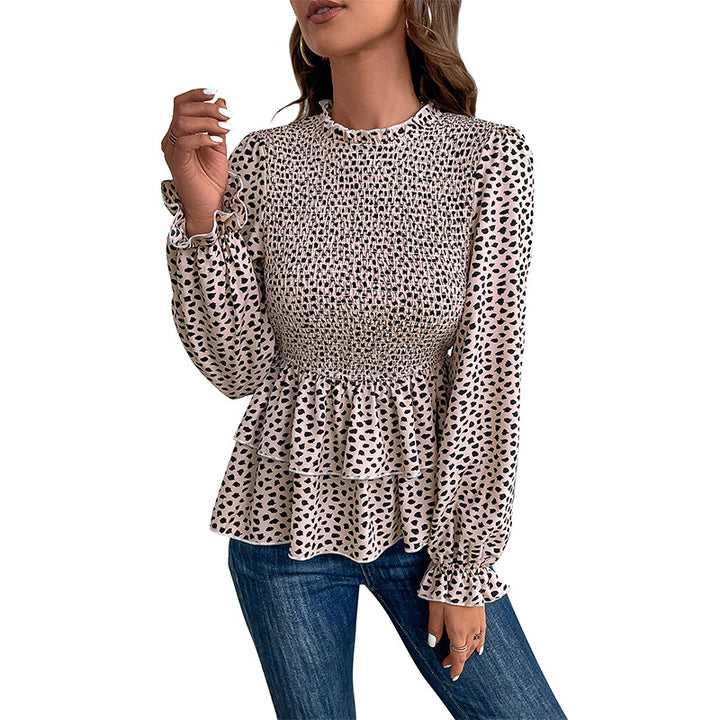Women’s blouse with extravagant gathered details and a chic polka dot pattern