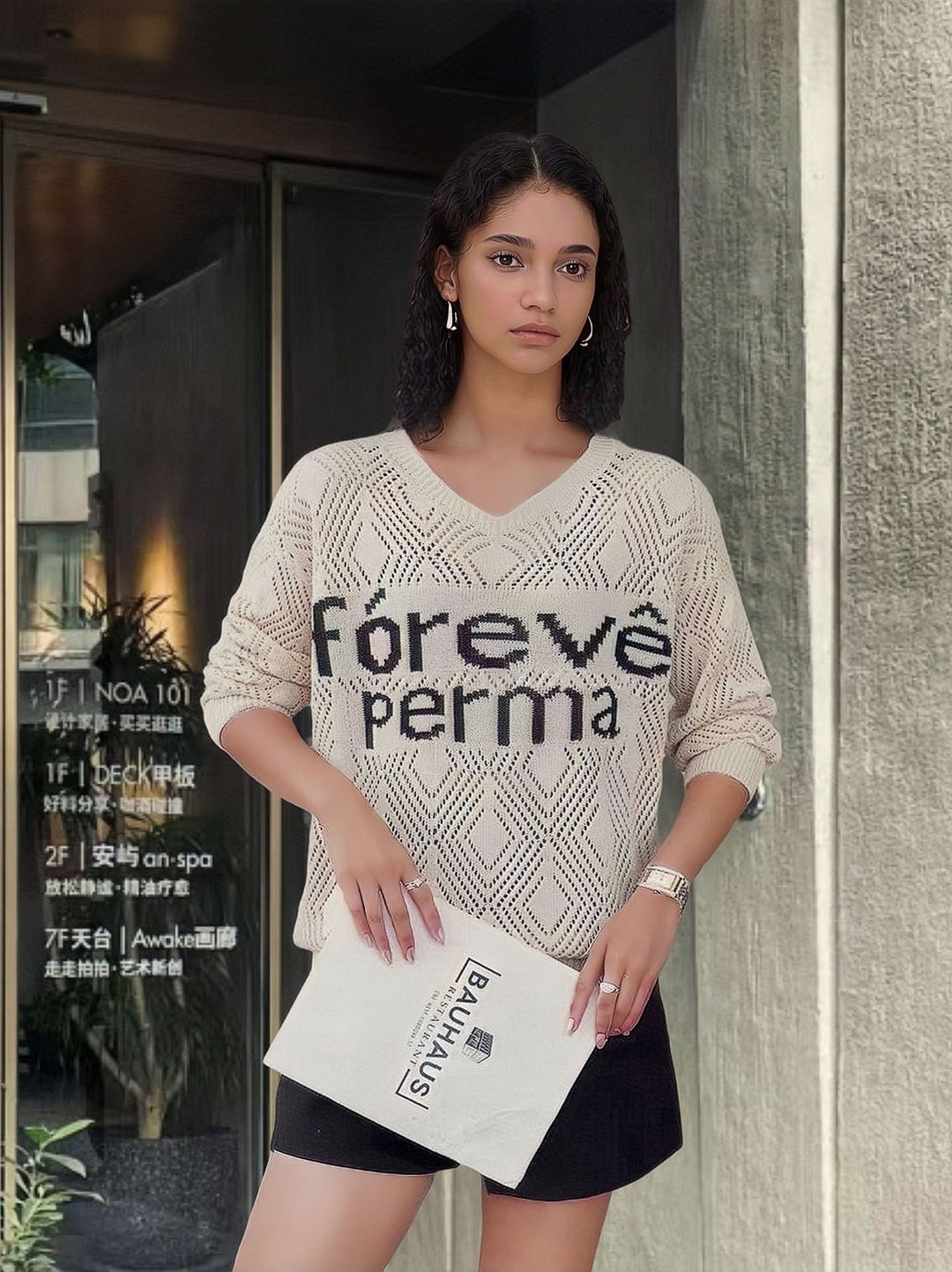 Trendy knitted sweater for women with a creative honeycomb pattern and a textured detail Lune London
