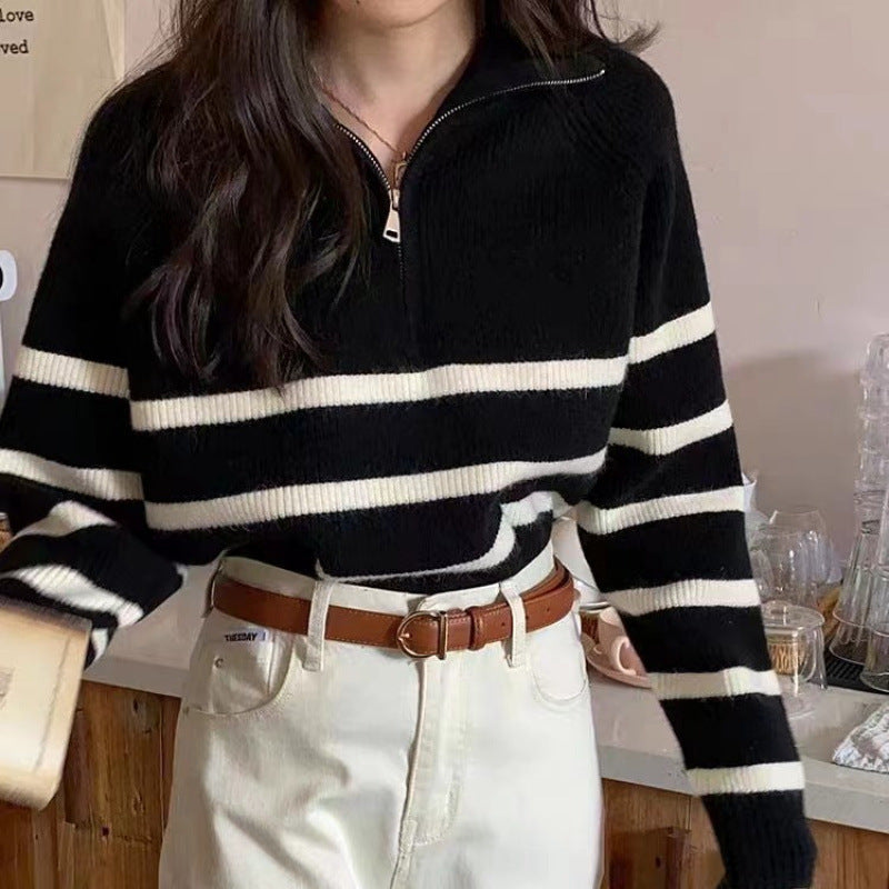 Pull féminin à la mode avec une fermeture éclair solide et un motif rayé Chic & Stil
