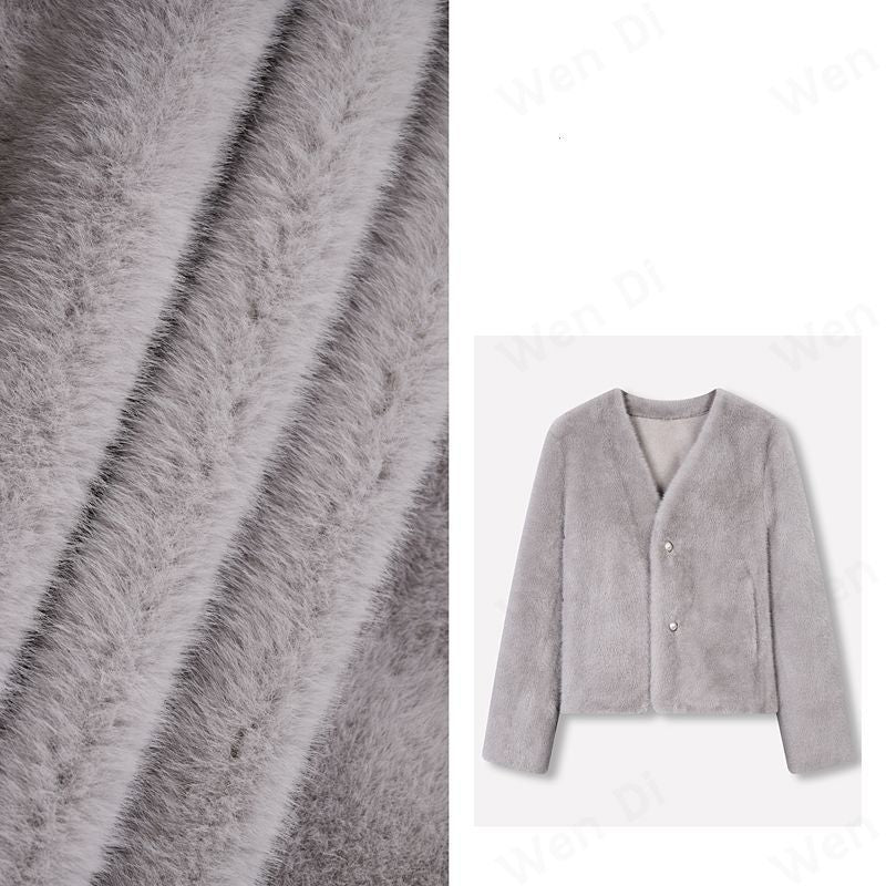 Veste courte en peluche pour femmes avec boutons élégants Chic & Stil