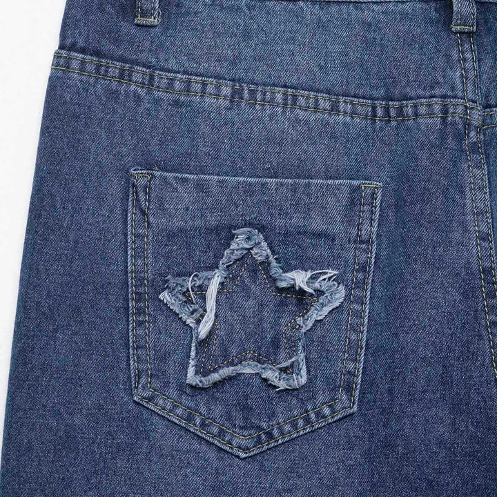 Flared women's jeans with floral embroidery and decorative button details Lune London