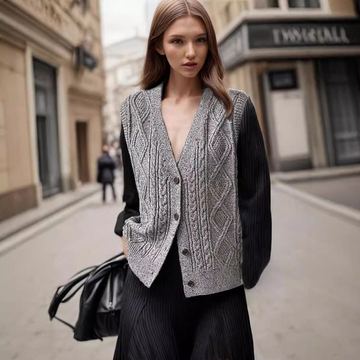 Women's knitted jacket with a modern cable pattern and chic elegant buttons.