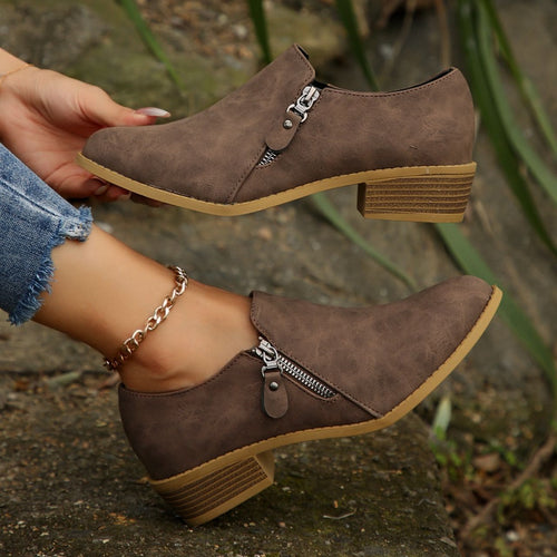 Trendy ankle boots for women with a chic zipper design Lune London