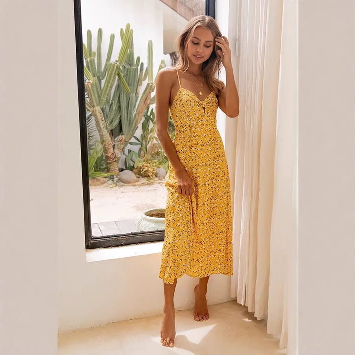 Summer dress for women with a lovely floral print and playful straps Lune London