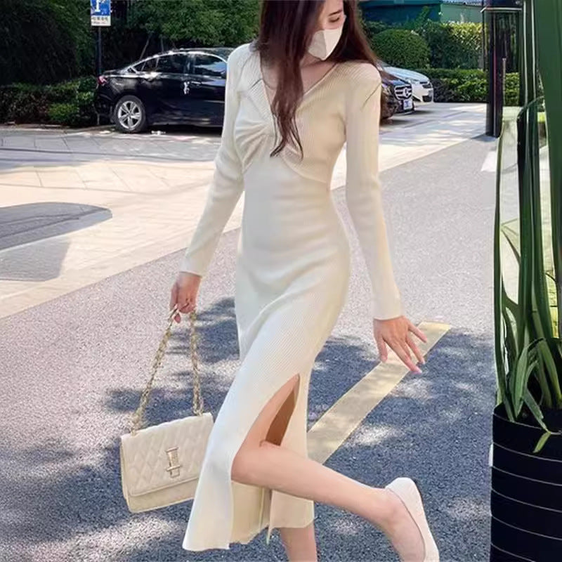 Knit dress for women with plunging V-neck and elegant ribbed structure Lune London