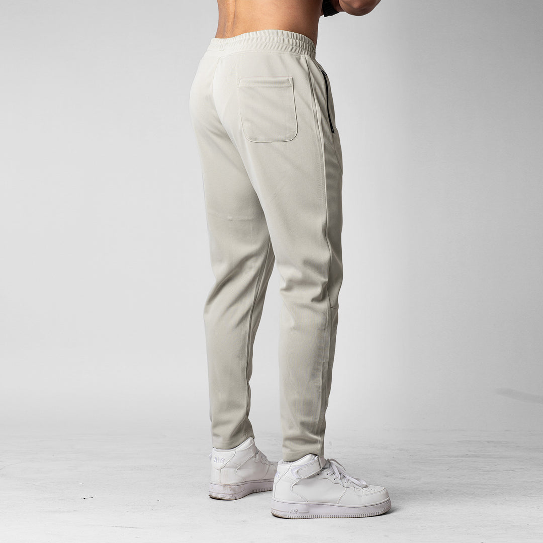 Men's sporty jogging pants with an innovative breathable structure and practical zippered pockets Lune London