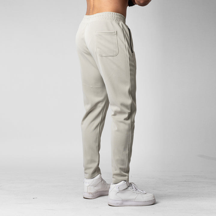 Men's sporty jogging pants with an innovative breathable structure and practical zippered pockets Lune London