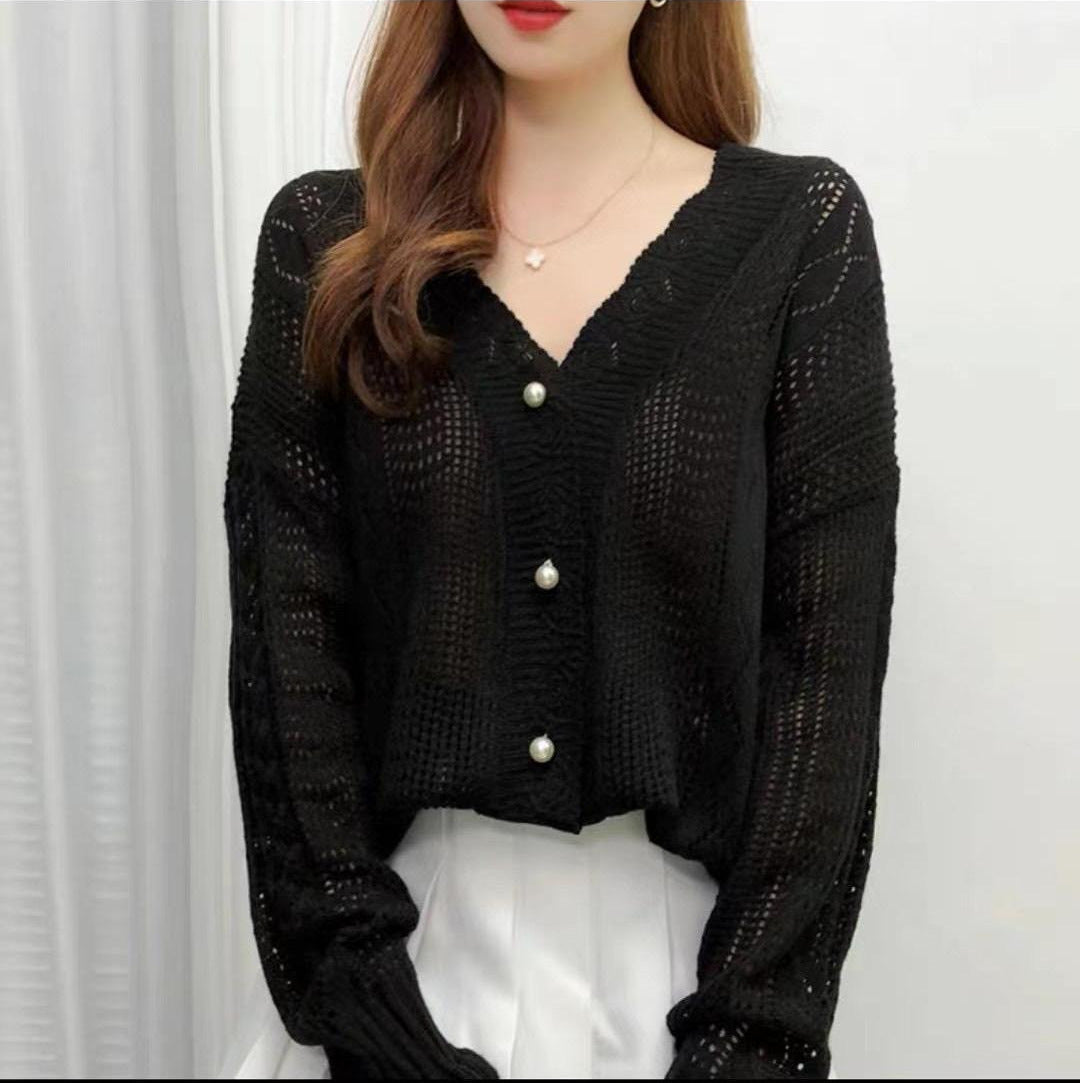 Casual knit jacket for women with an elegant cable pattern and large buttons Lune London