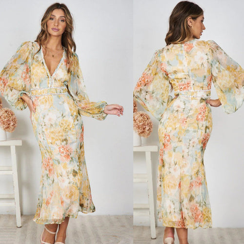 Robe maxi femme avec des manches volumineuses et des détails décoratifs Chic & Stil