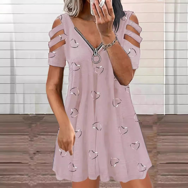 Leisure dress for women with cutout sleeves and a heart-shaped pattern Lune London