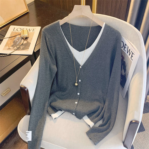Casual knitted jacket for women with a fine ribbed structure and a deep V-neck Lune London