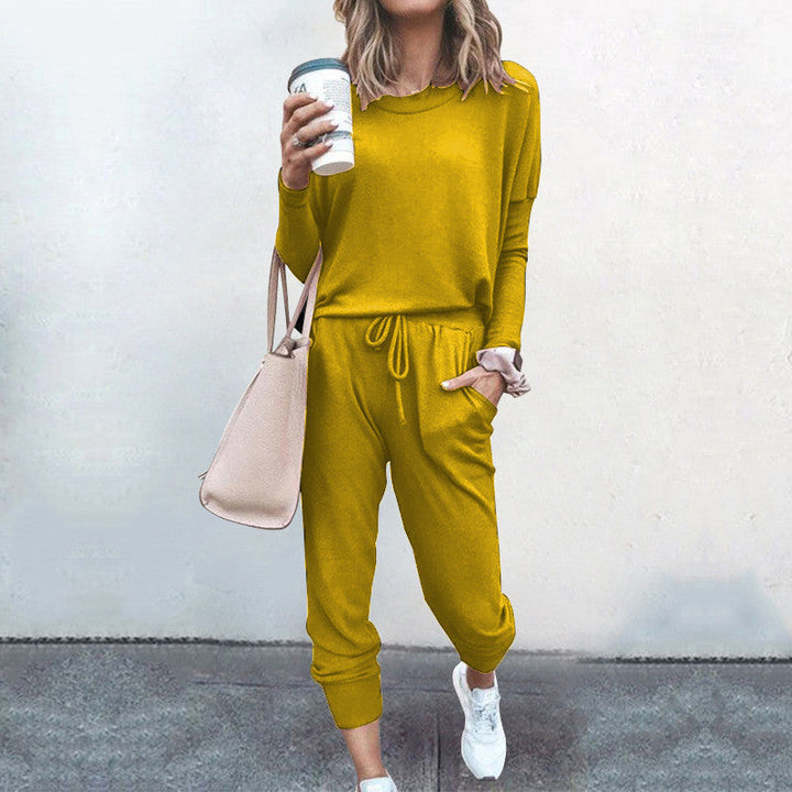 Women's Comfortable Jumpsuit with Stylish Round Neckline and Adjustable Waistband Lune London