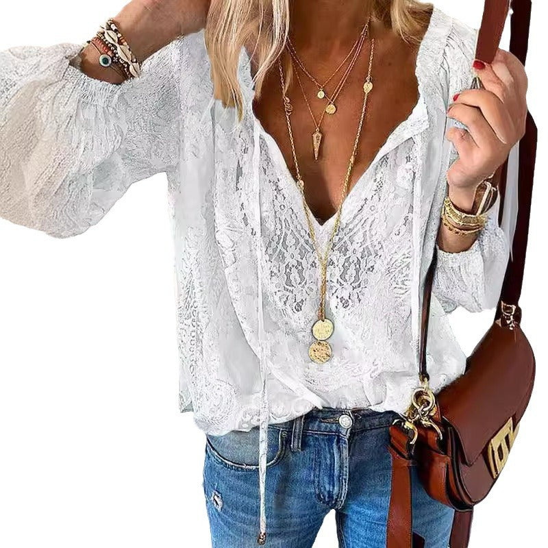 Women's elegant blouse with fine lace and deep V-neck Lune London