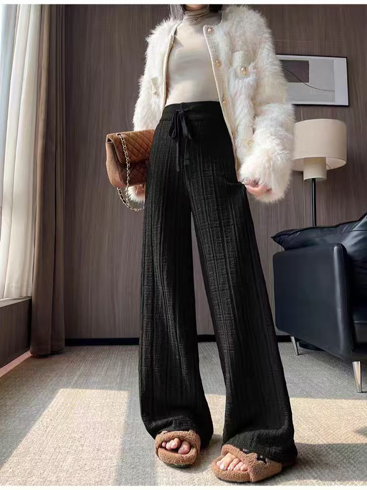 Loose linen pants for women with elastic waistband and striped design Lune London