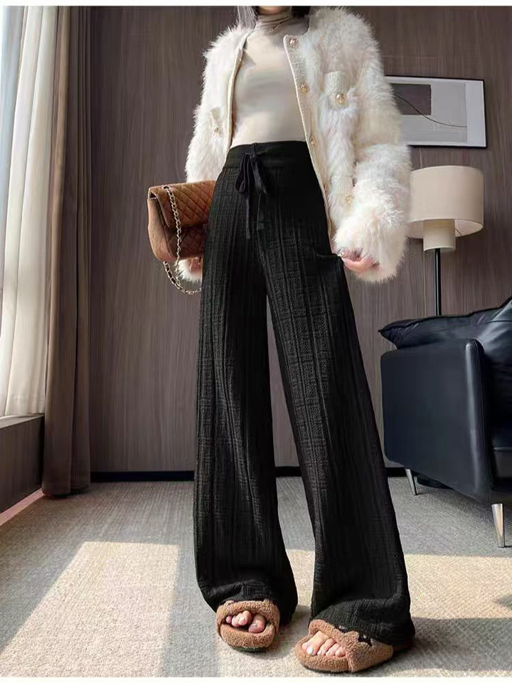 Pantalon palazzo élégant pour dames avec taille haute et ceinture à nouer sur le côté Chic & Stil