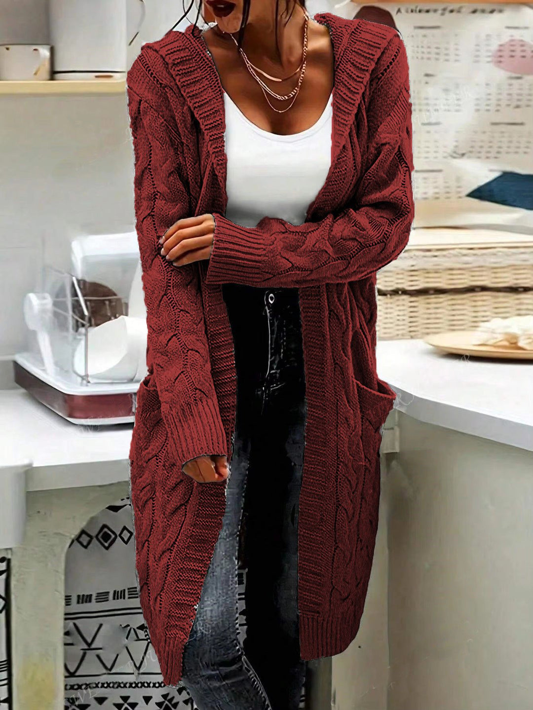 Chunky knit cardigan for women with practical pockets and elegant twisted details Lune London