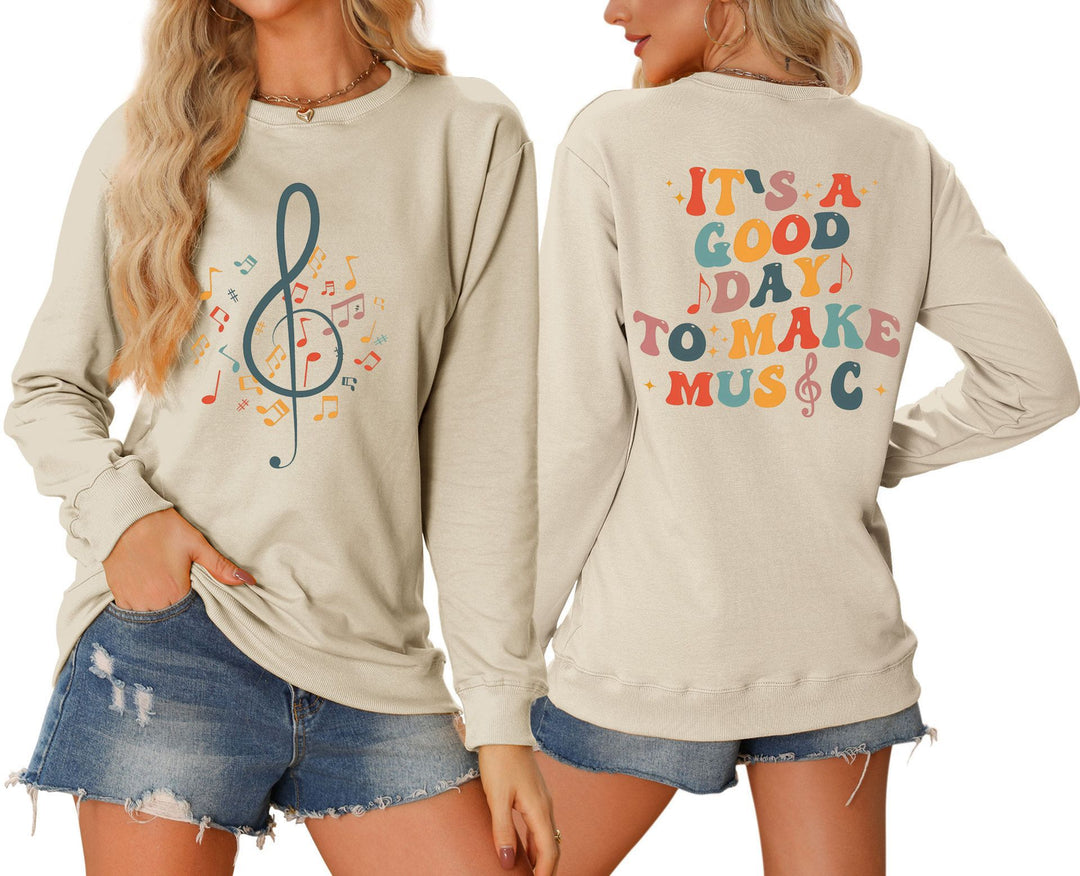Sweatshirt pour femmes avec motif musical et lettrage créatif Chic & Stil