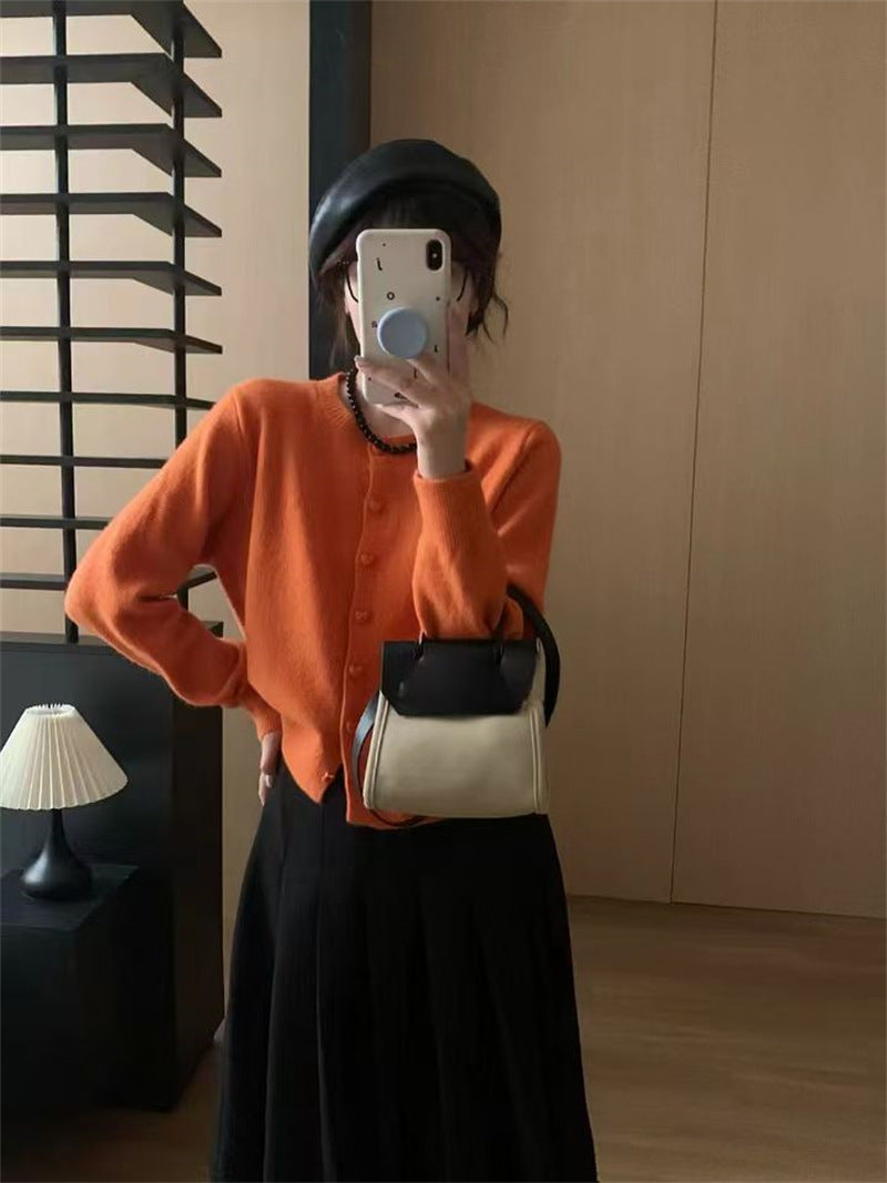 Cardigan en tricot doux pour femmes avec des boutons et une texture côtelée Chic & Stil