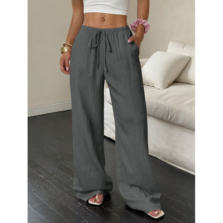 Casual and wide trousers for women with elastic waist and tie belt Lune London