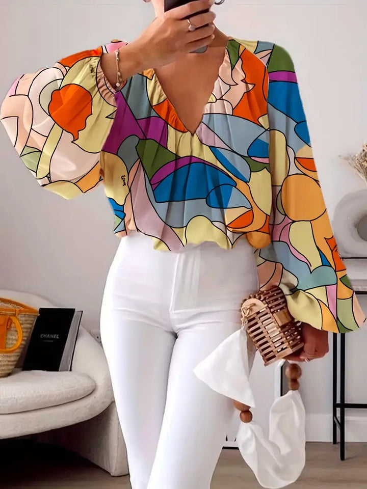 Blouse for women with V-neck and trendy graphic design Lune London