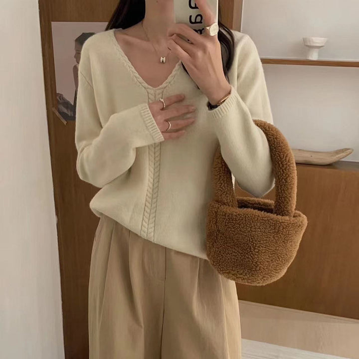 Pull élégant pour femmes en V avec un motif de câble fin Chic & Stil