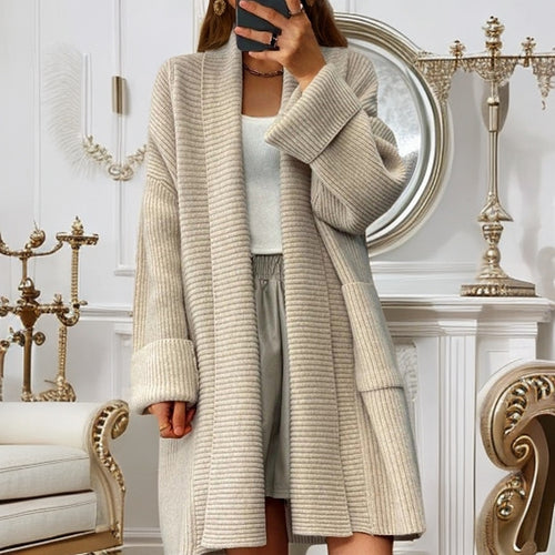 Long knitted coat for women with textured design and pockets Lune London