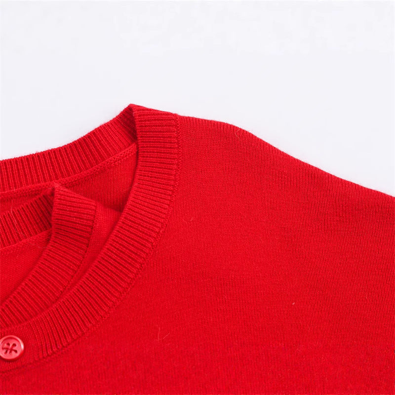 Short knitted sweater for women with button detail and V-neck Lune London