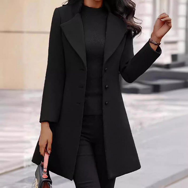 Elegant wool coat for women with a structured cut and a double-button design.