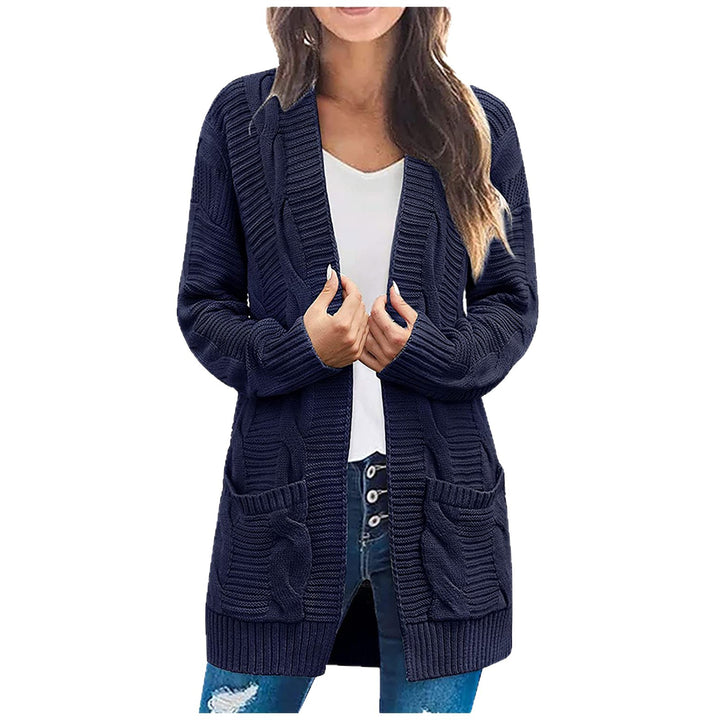 Ladies chunky knit cardigan with elegant cable patterns and practical pockets Lune London