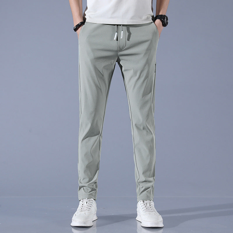 Sports jogger pants for men with elastic waist and practical zip pockets Lune London