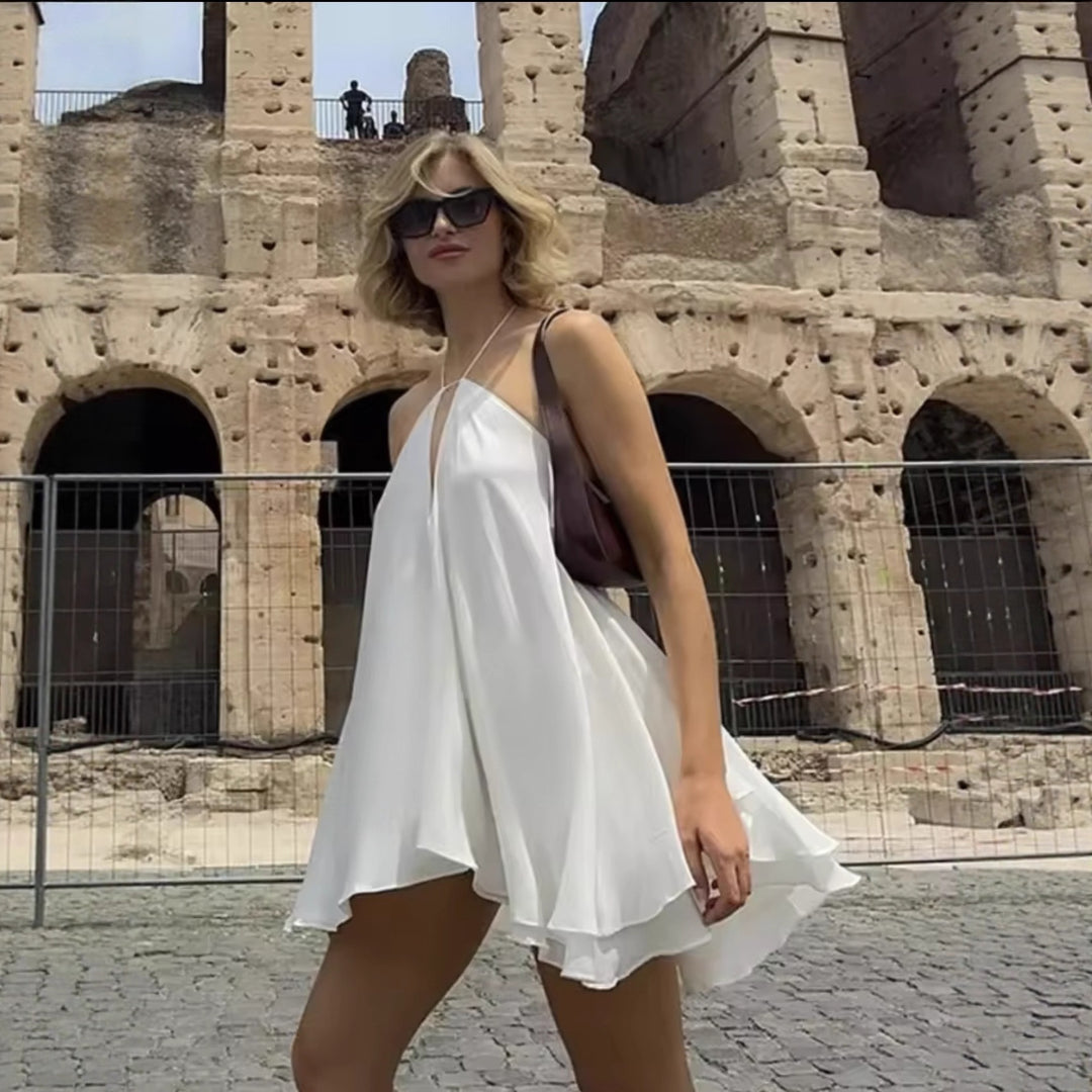 Light chiffon dress for ladies with deep V-neck and adjustable straps Lune London