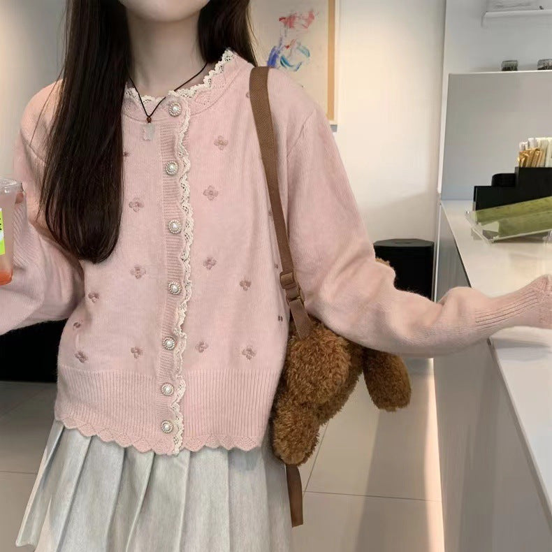 Ladies Elegant knitted cardigan with pearl buttons and structured design Lune London