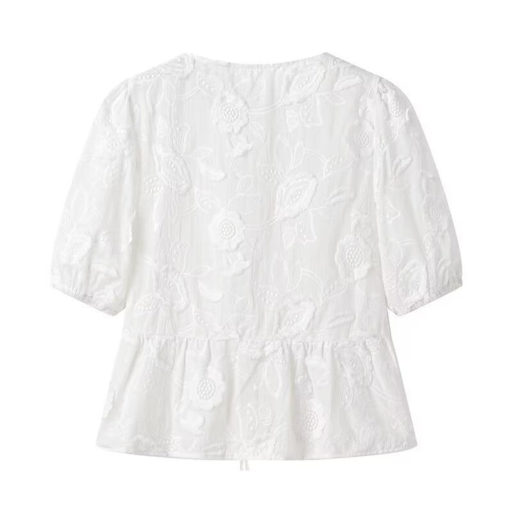 Women's blouse with embroidered floral pattern and romantic ruffle details Lune London