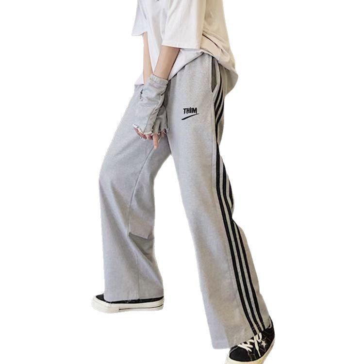 Pantalons décontractés sportifs pour femmes avec des rayures modernes Chic & Stil