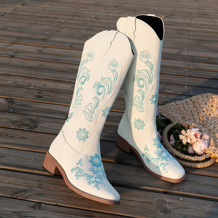 Women's cowboy boots with handmade floral details and a comfortable block heel Lune London