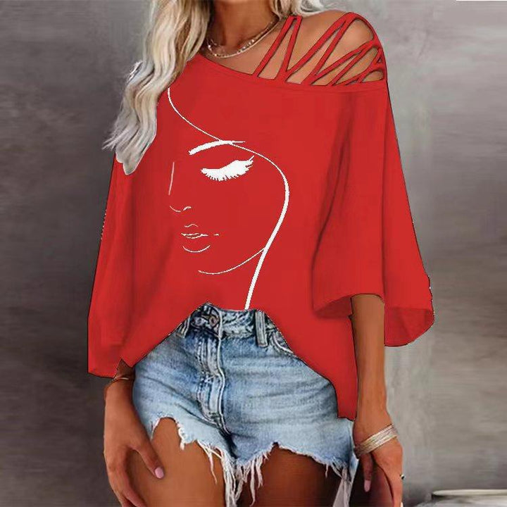 Women's tunic with asymmetric strap design and stylized face graphic Lune London