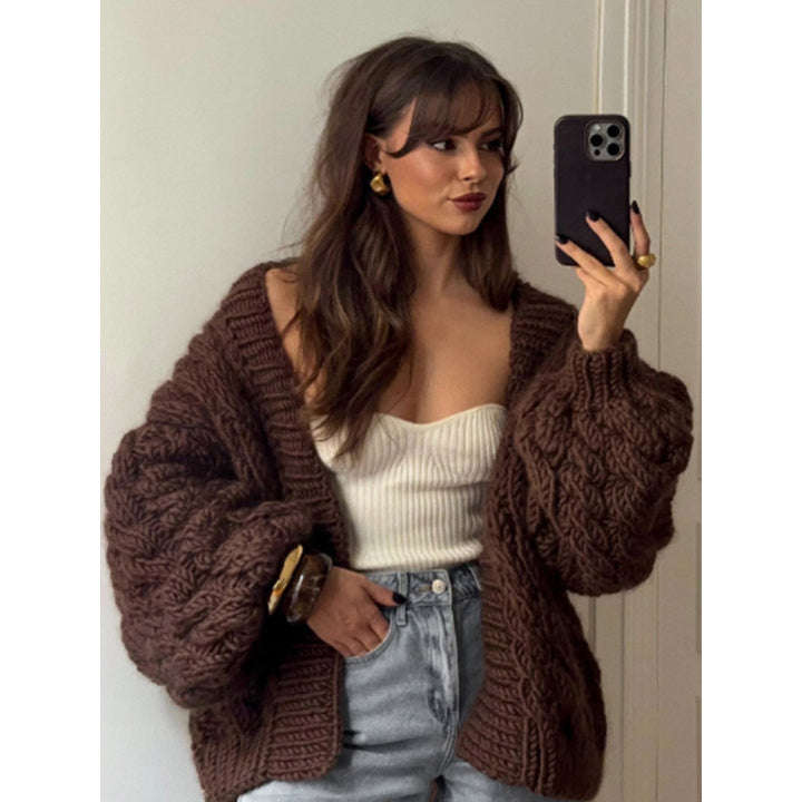 Thick knit jacket for women with an oversized fit and elegant braided patterns Lune London