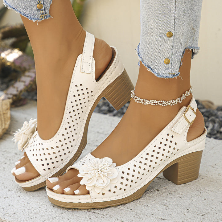 Comfort sandals for women with breathable inserts and delicate flower application Lune London
