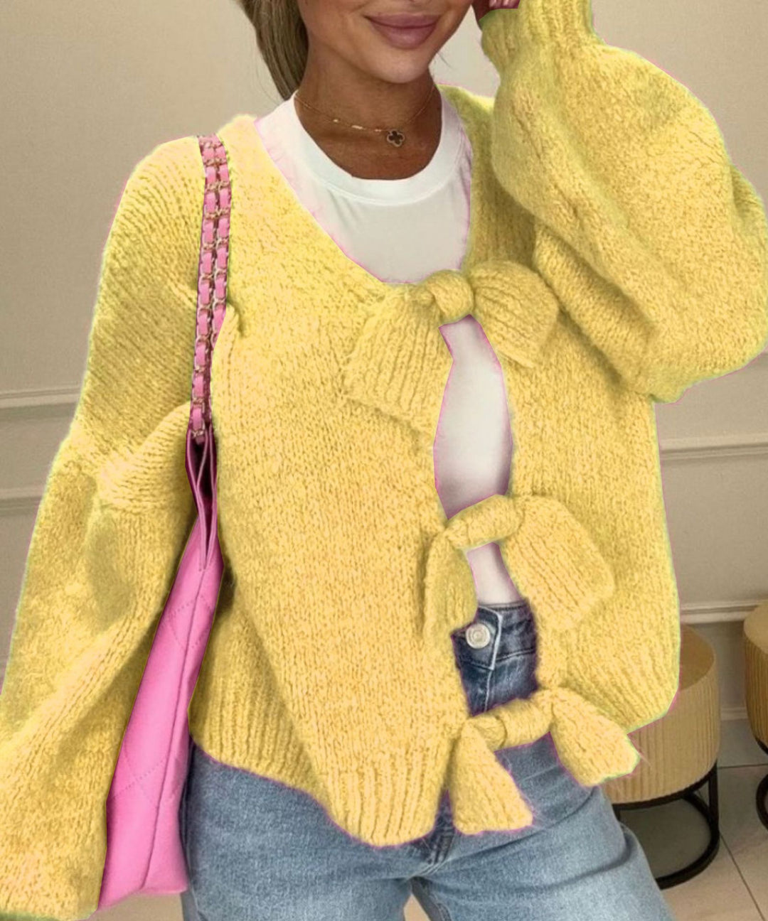 Fashionable knitted jacket for women with playful knots Lune London