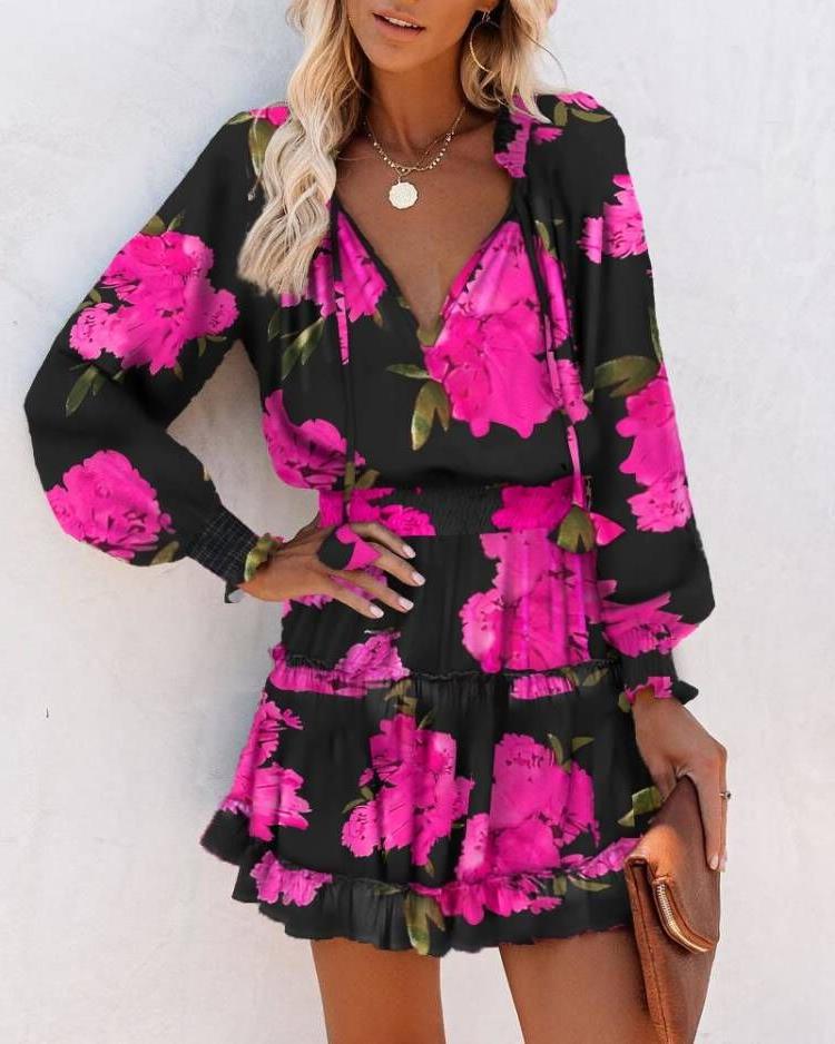 Ladies mini playful dress with colorful pattern and flounced details Lune London