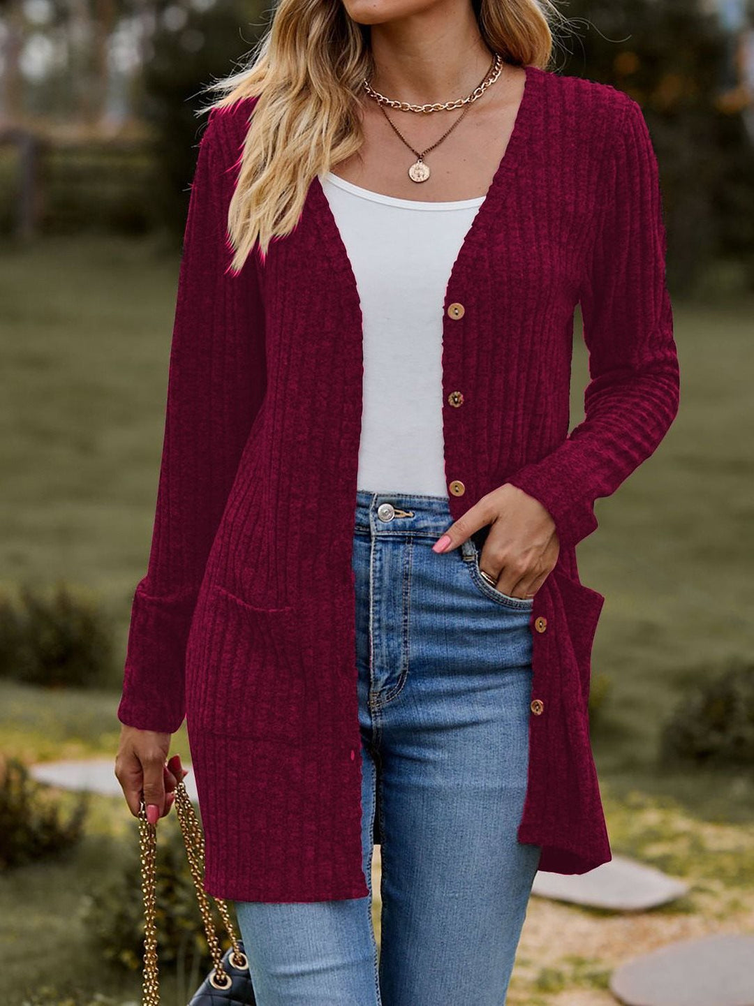 Women's knitted jacket with V-neck and practical pockets Lune London