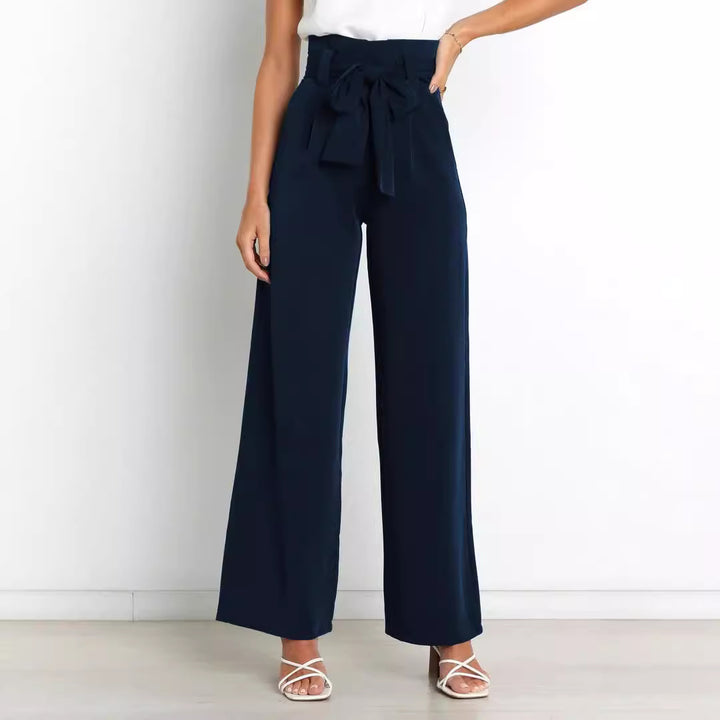 Wide fabric trousers for women with a tie belt and stylish pockets Lune London