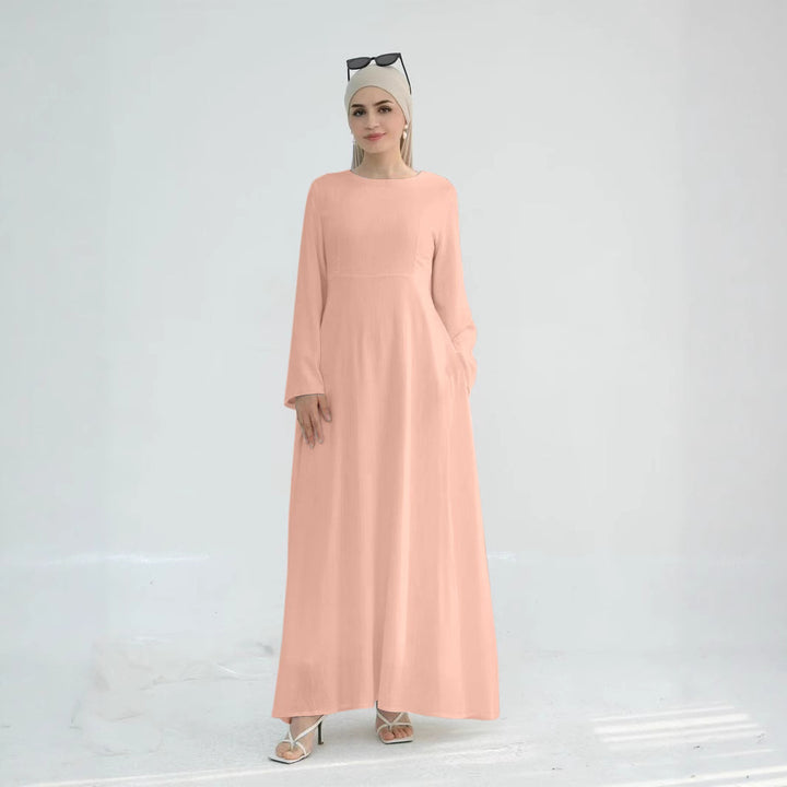 Elegant maxi dress for women with long sleeves and side pockets Lune London