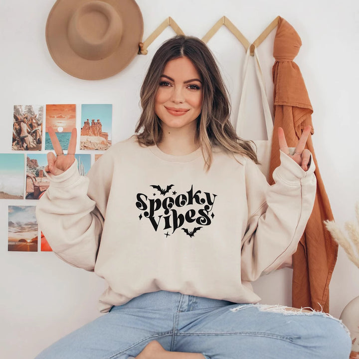 Sweat à capuche pour femmes avec un design Halloween ludique et une coupe confortable Chic & Stil