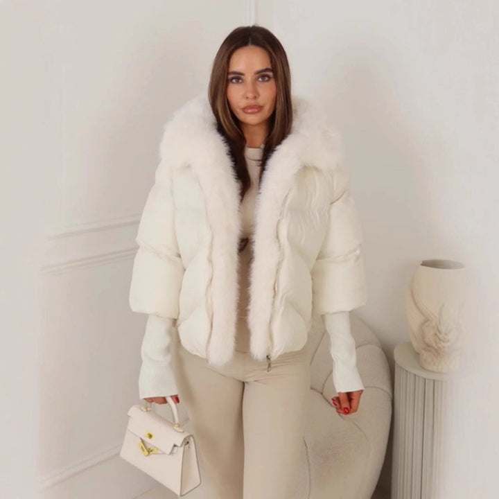 Veste d'hiver pour femmes avec un luxueux col en fausse fourrure et un design matelassé Chic & Stil