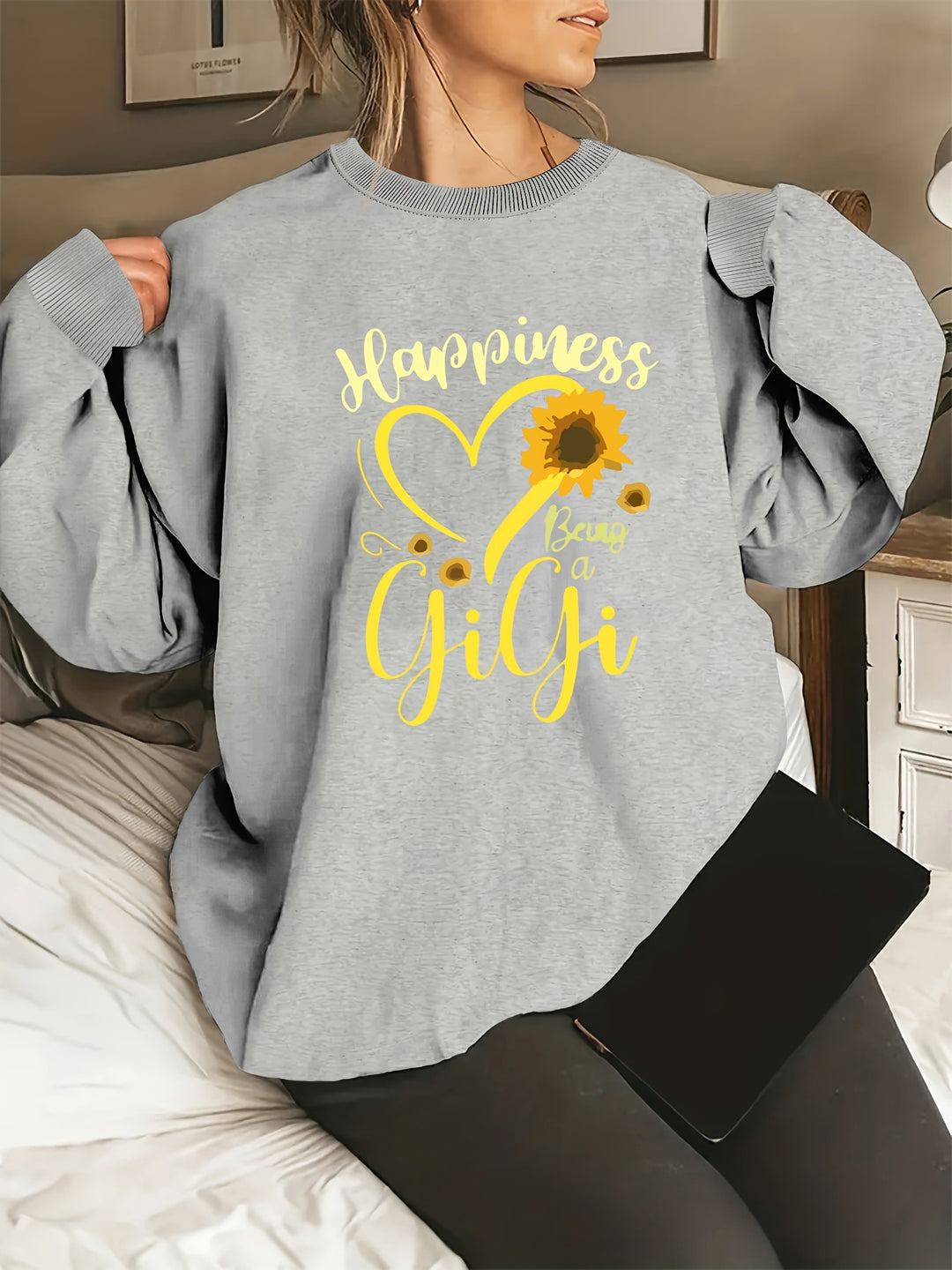 Sweatshirt pour femme avec des manches volumineuses et un motif joyeux Chic & Stil